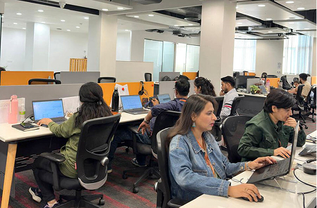 Employees at their work stations